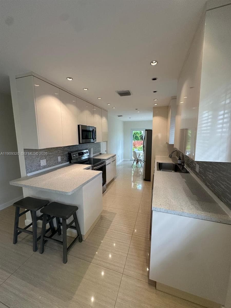 9464 Abbott Ave, Surfside FL 33154 — 9