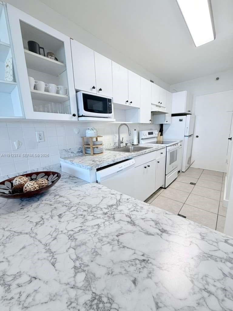 100 Lincoln Rd # 1220, Miami Beach FL 33139 — 5