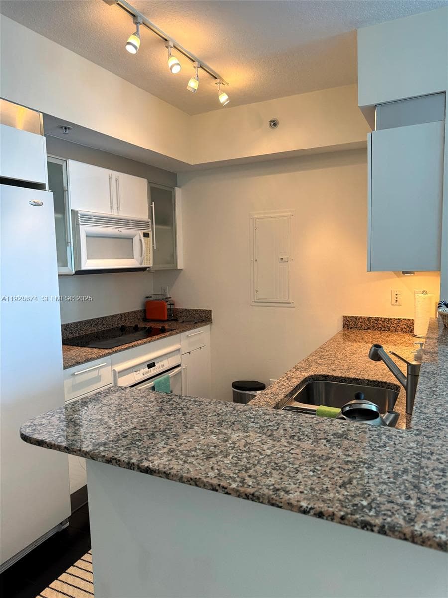 335 S Biscayne Blvd # 2403, Miami FL 33131 — 6
