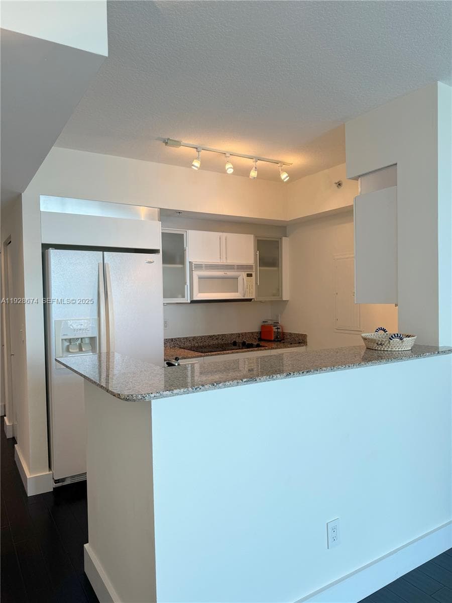 335 S Biscayne Blvd # 2403, Miami FL 33131 — 5