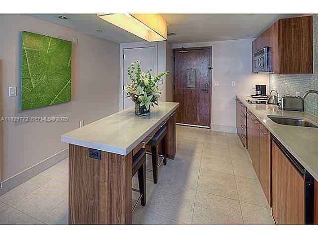 6801 Collins Ave # 309, Miami Beach FL 33141 — 25