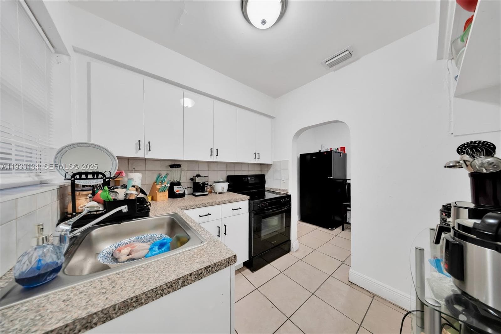 115 NW 56th Ave, Miami FL 33126 — 8
