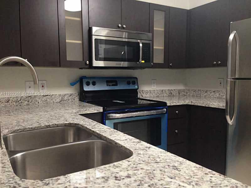 4350 NW 107th Ave # 102, Doral FL 33178 — 5
