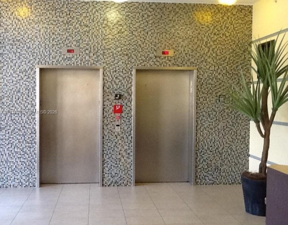36 NW 6th Ave # 906, Miami FL 33128 — 25