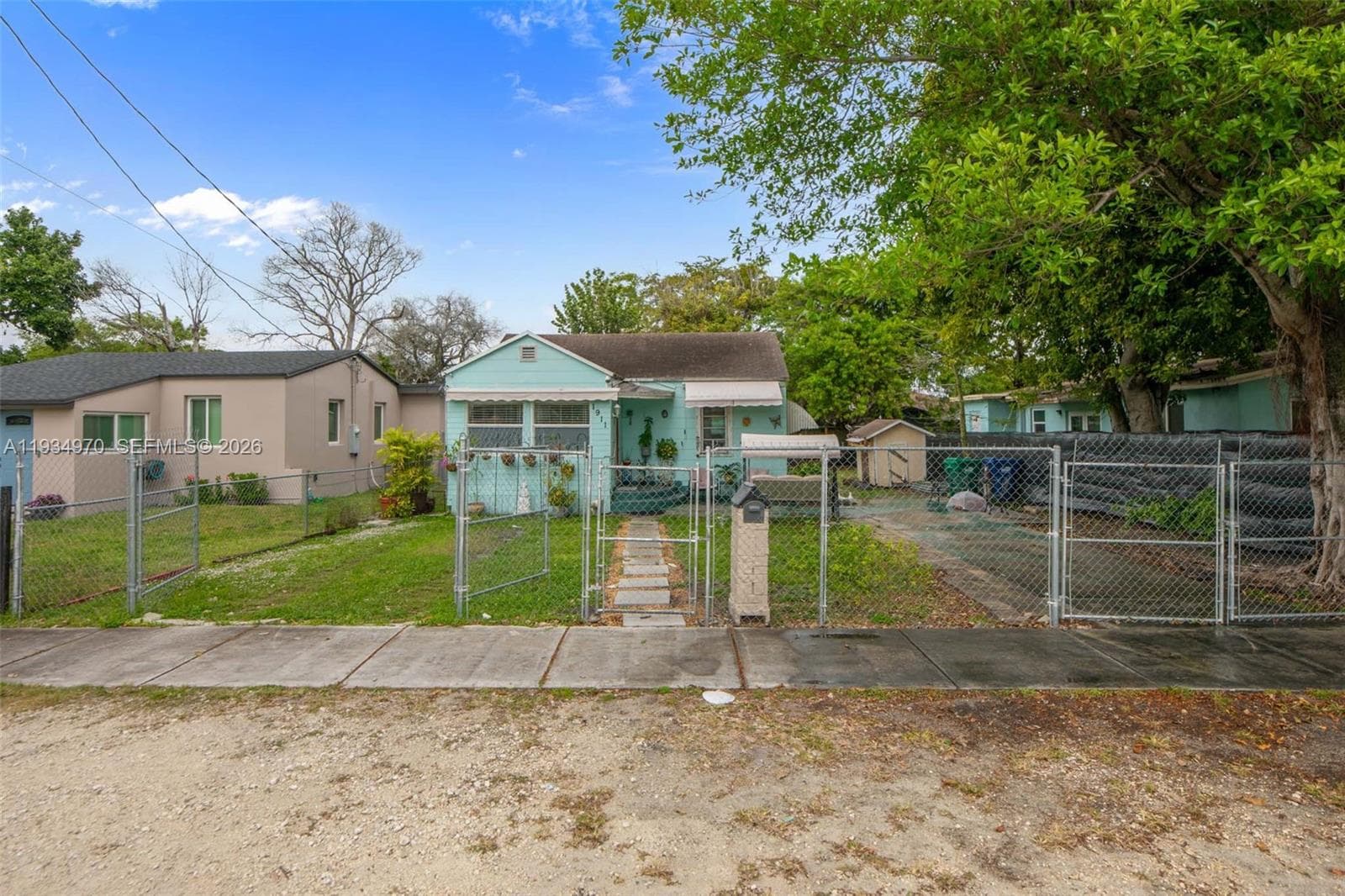 1911 NW 52nd St, Miami FL 33142 — 32