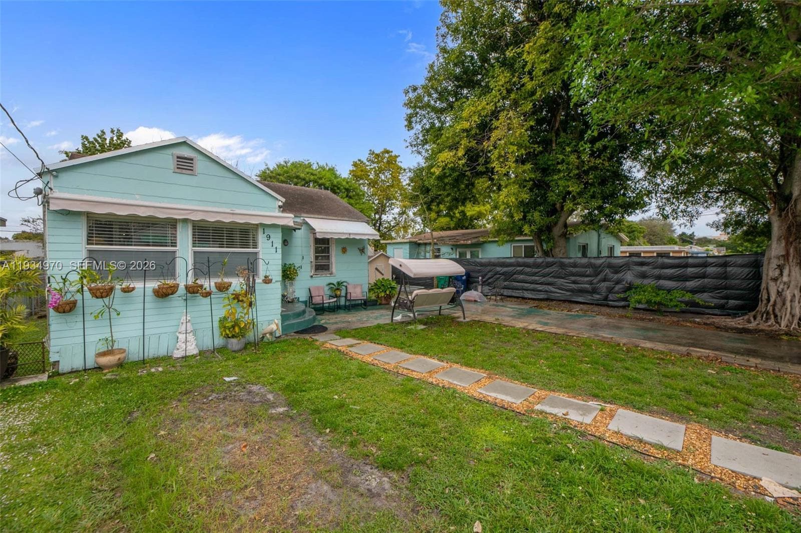 1911 NW 52nd St, Miami FL 33142 — 33