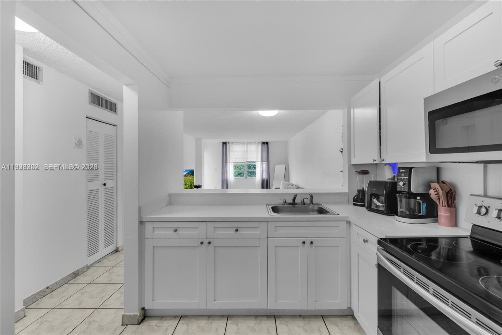 1250 NE 125th St # 311C, North Miami FL 33161 — 9