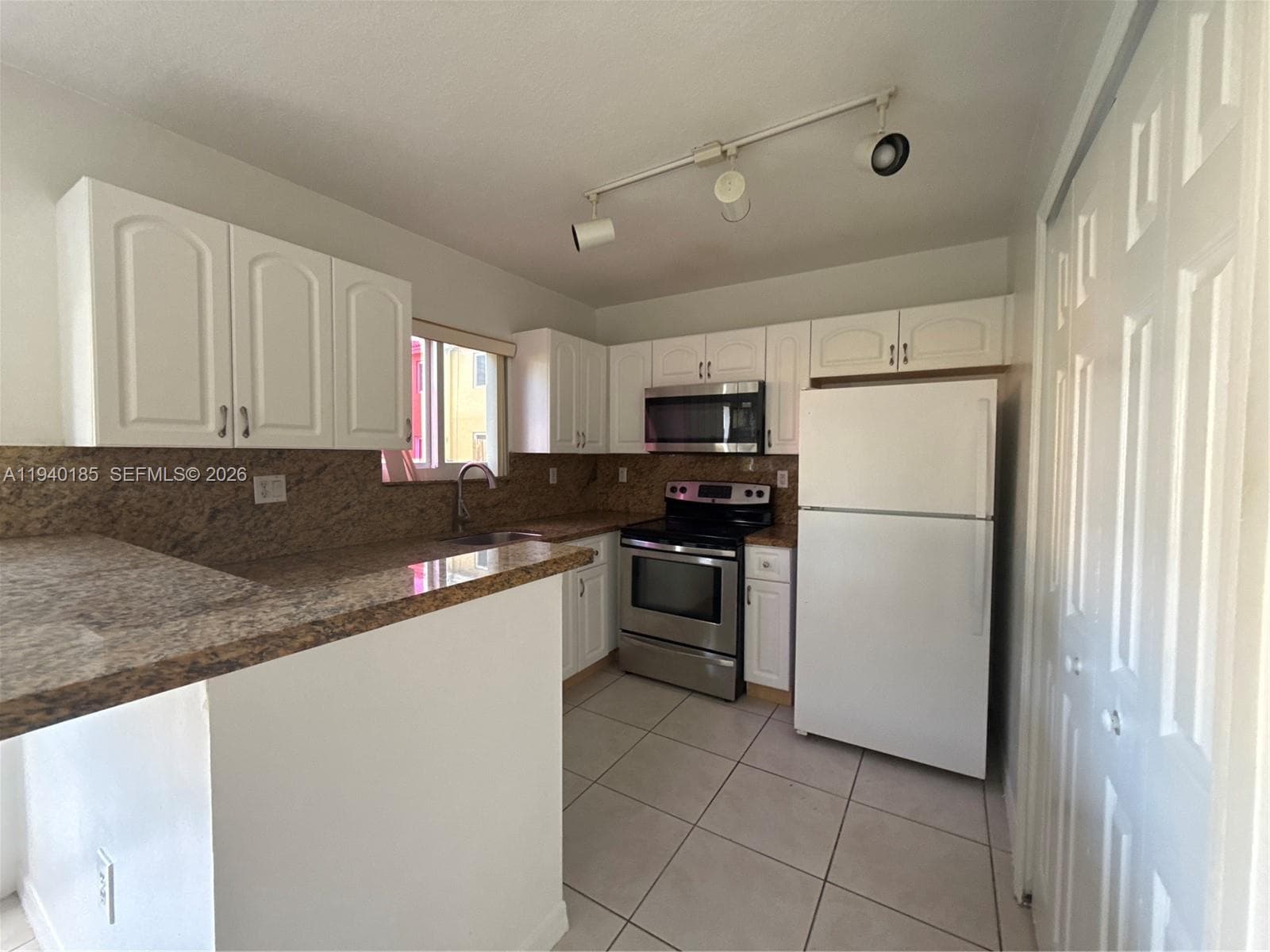 935 NE 33rd Terr # 104, Homestead FL 33033 — 4