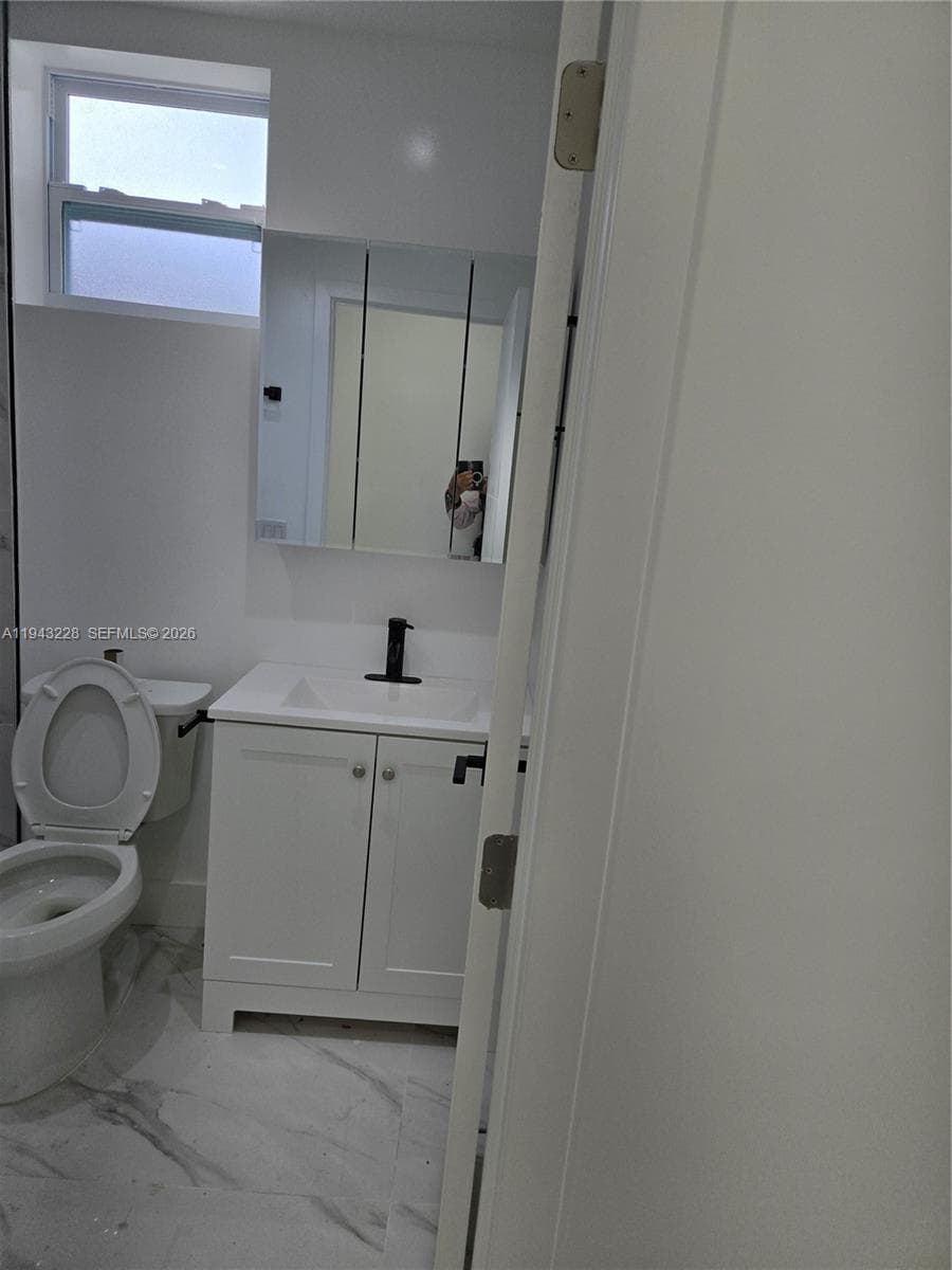 987 NE 145 # B, North Miami FL 33161 — 7