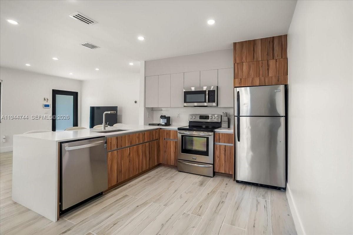 70 NW 47th Ter, Miami FL 33127 — 13
