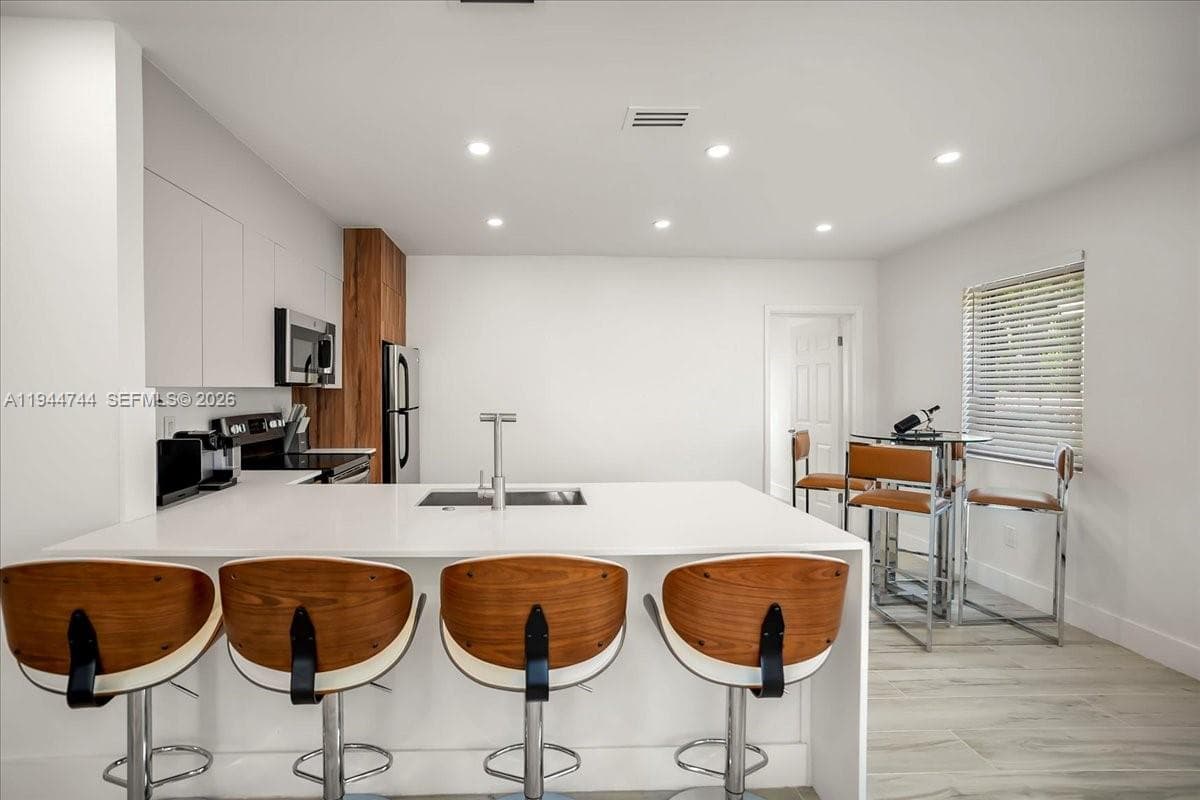 70 NW 47th Ter, Miami FL 33127 — 10