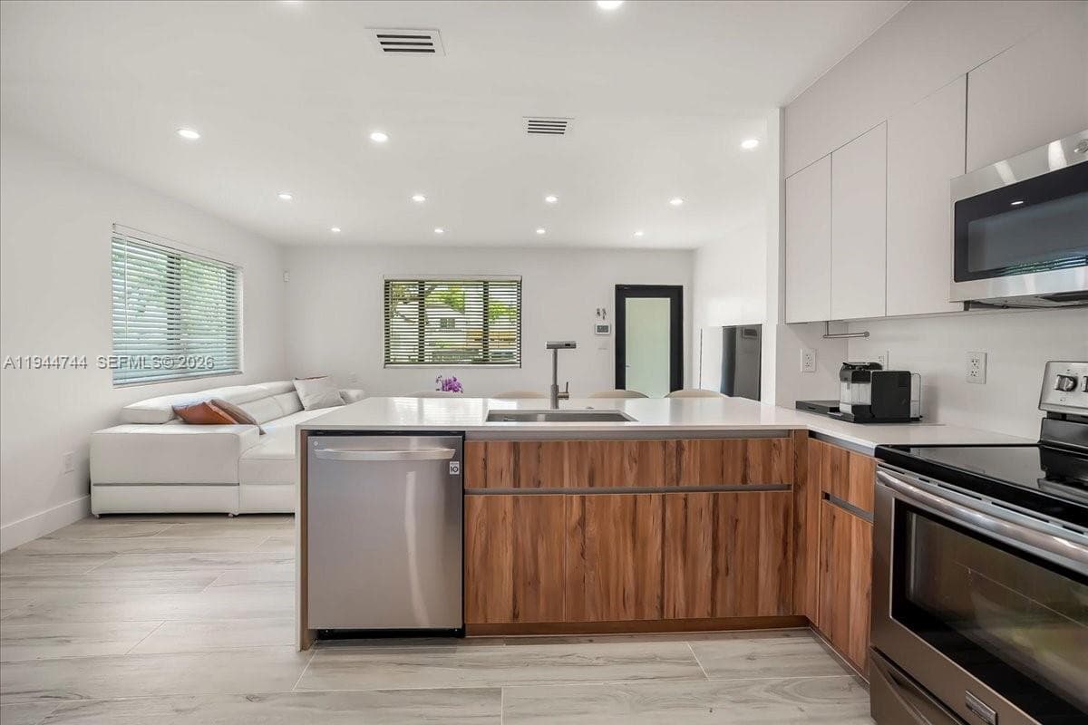 70 NW 47th Ter, Miami FL 33127 — 14