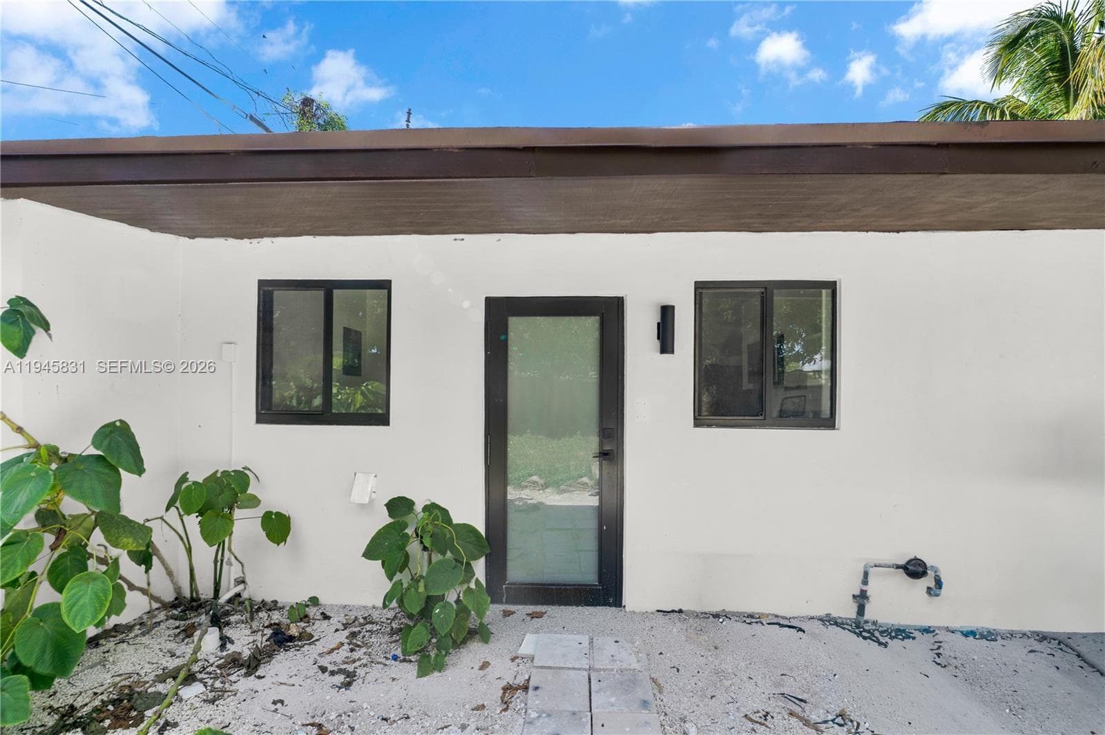 3040 NW 93rd # D, Miami FL 33147 — 1