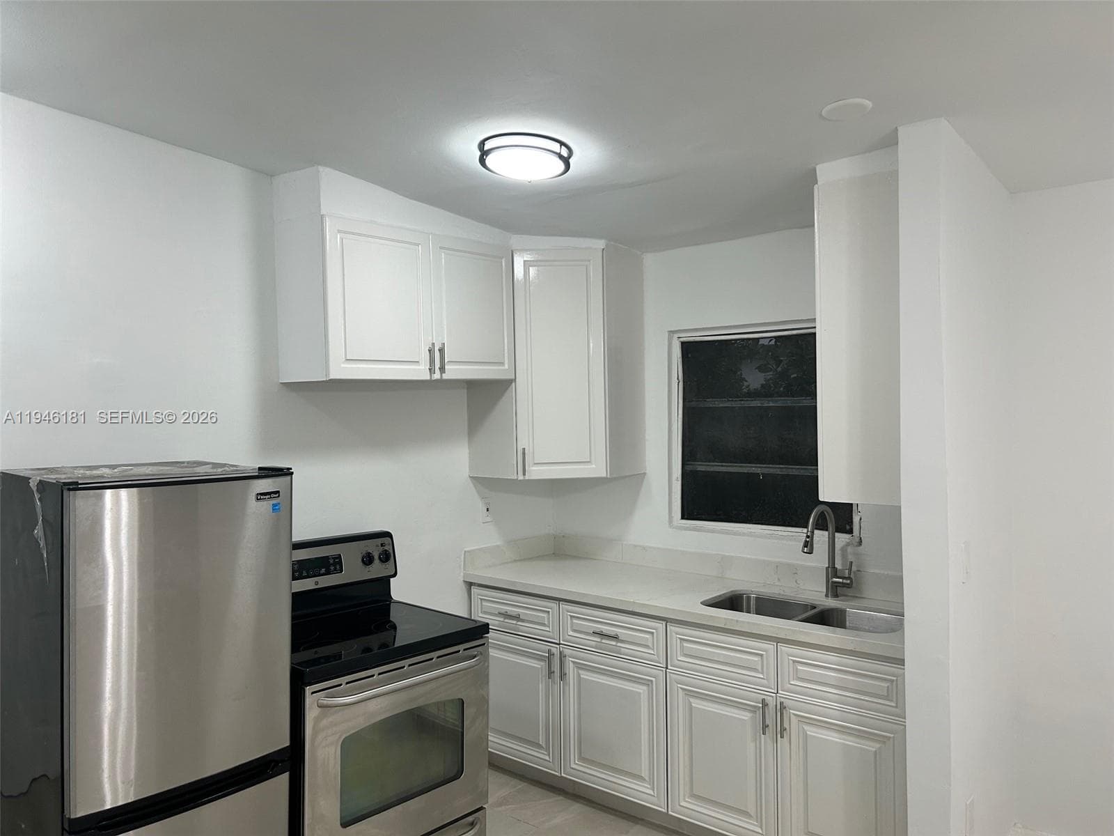 261 NW 49th St # C, Miami FL 33127 — 18