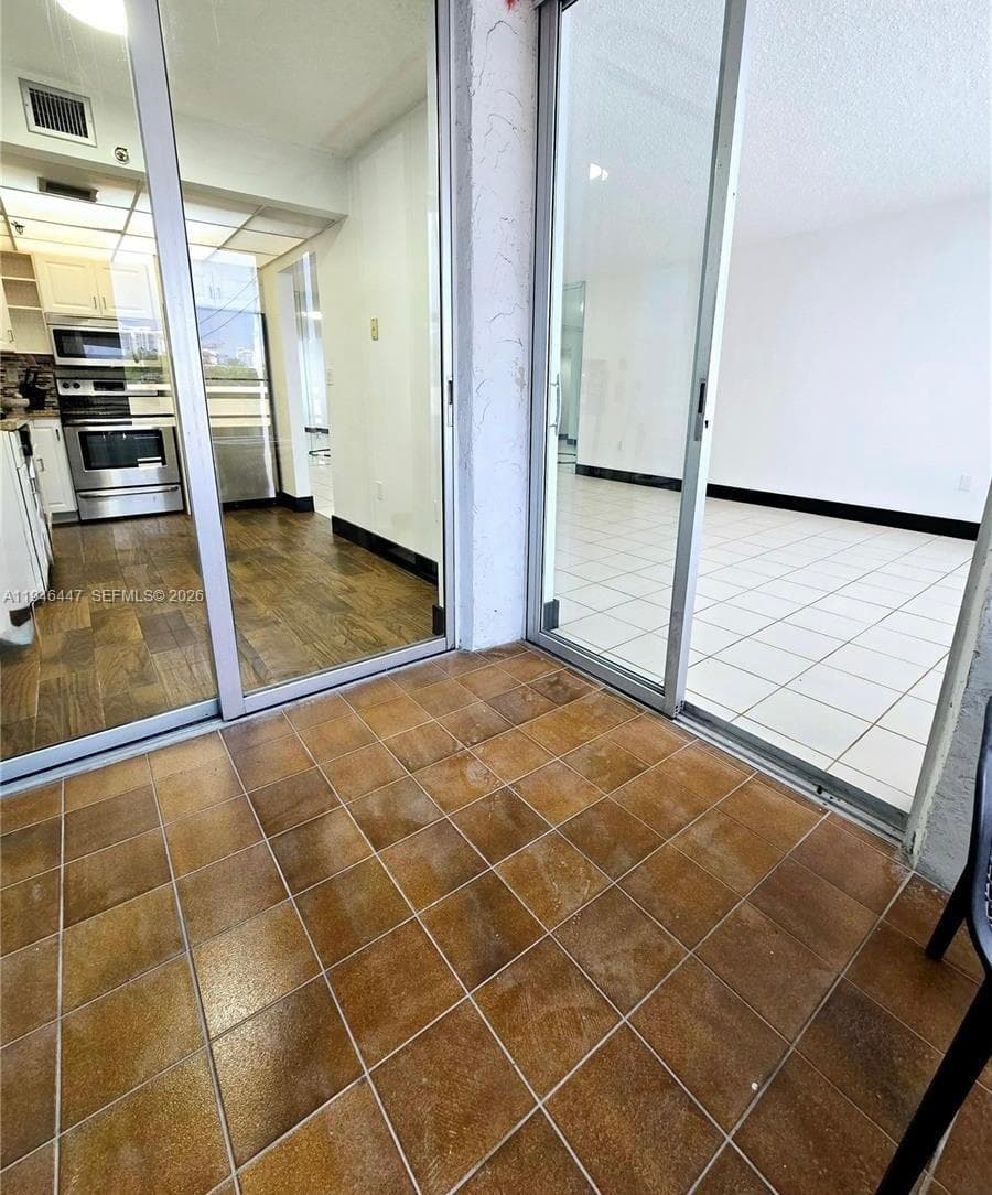 17890 W Dixie # 302, Miami FL 33160 — 13