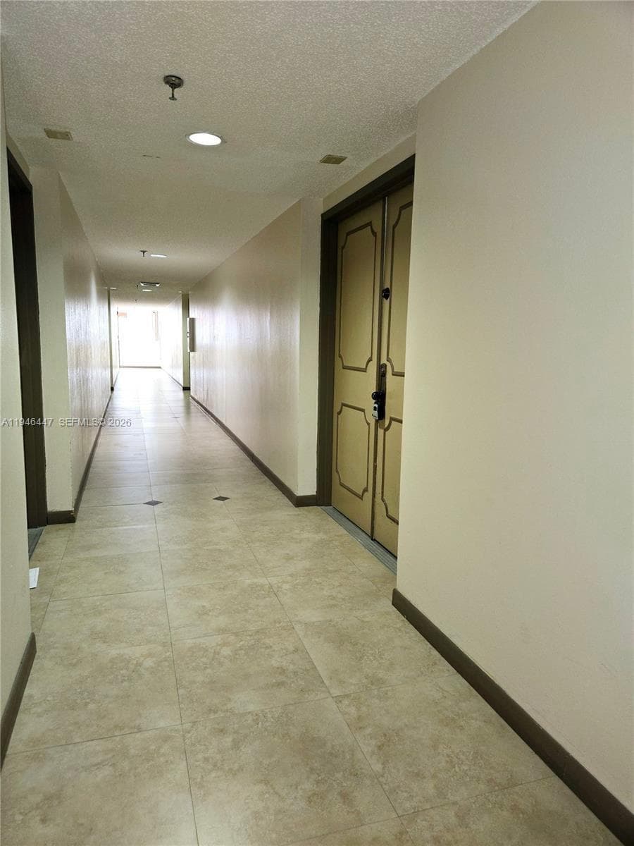 17890 W Dixie # 302, Miami FL 33160 — 18