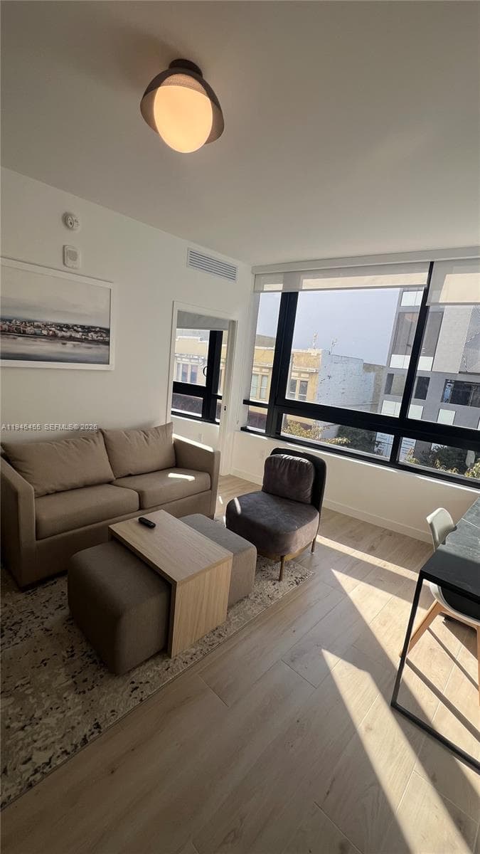 225 N Miami Ave # 312, Miami FL 33128 — 12