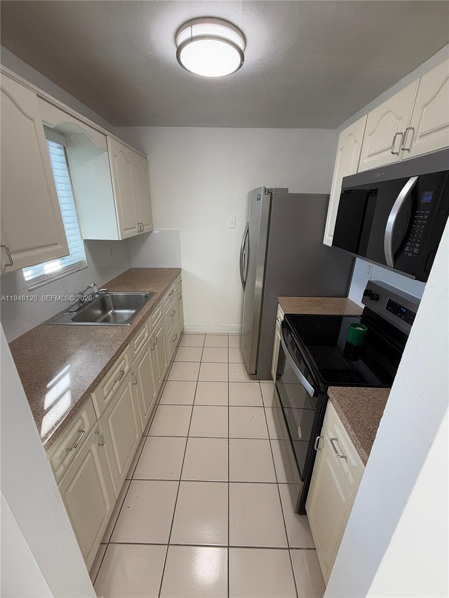 7105 W 13th Ave # 402, Hialeah FL 33014 — 5