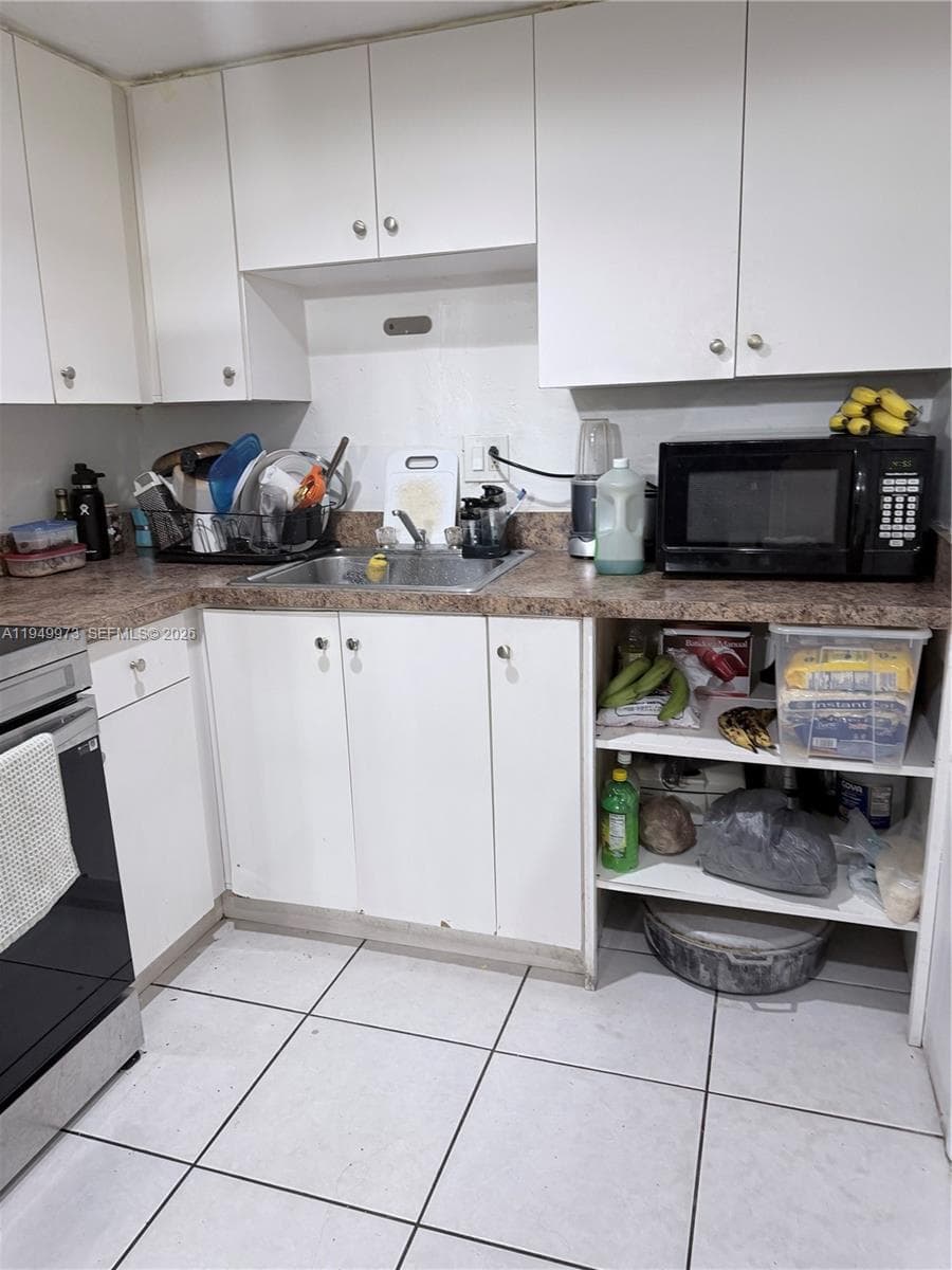 11930 NE 19th Dr # 28, North Miami FL 33181 — 9