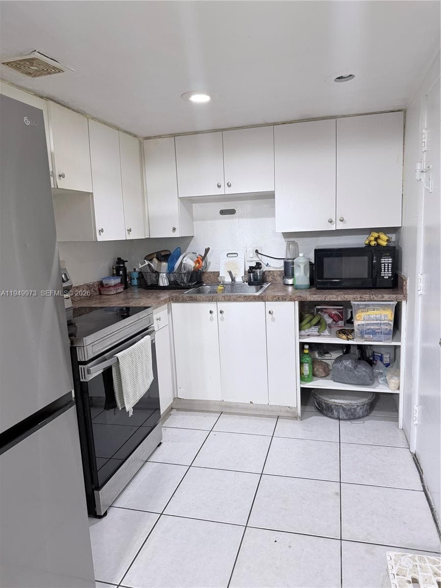 11930 NE 19th Dr # 28, North Miami FL 33181 — 8