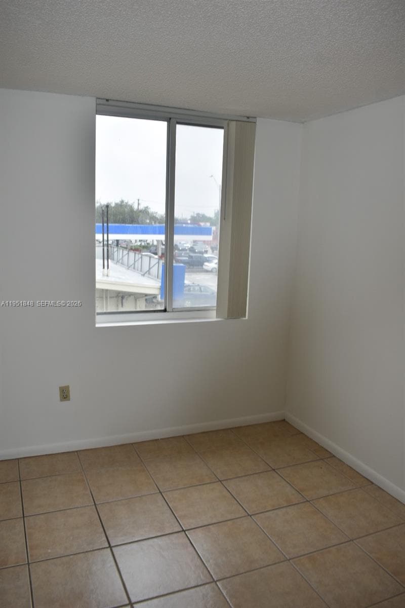 616 NW 26th Ave # 210, Miami FL 33125 — 12