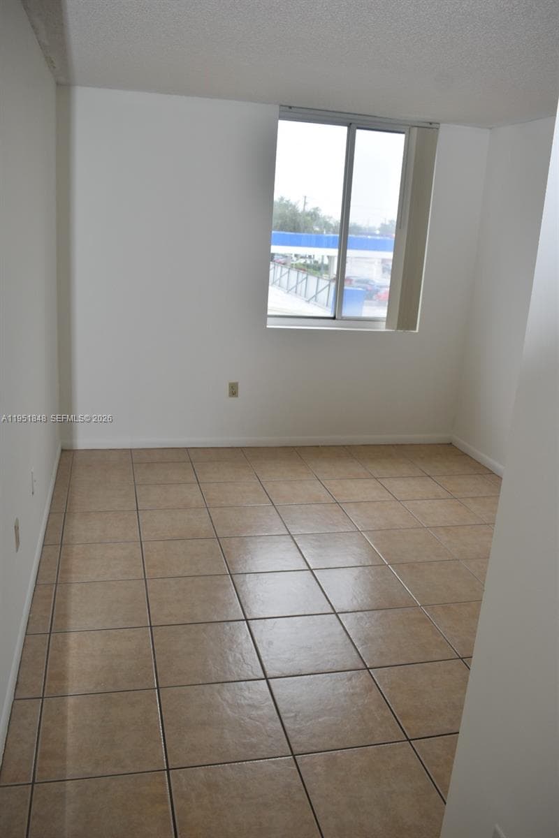 616 NW 26th Ave # 210, Miami FL 33125 — 11