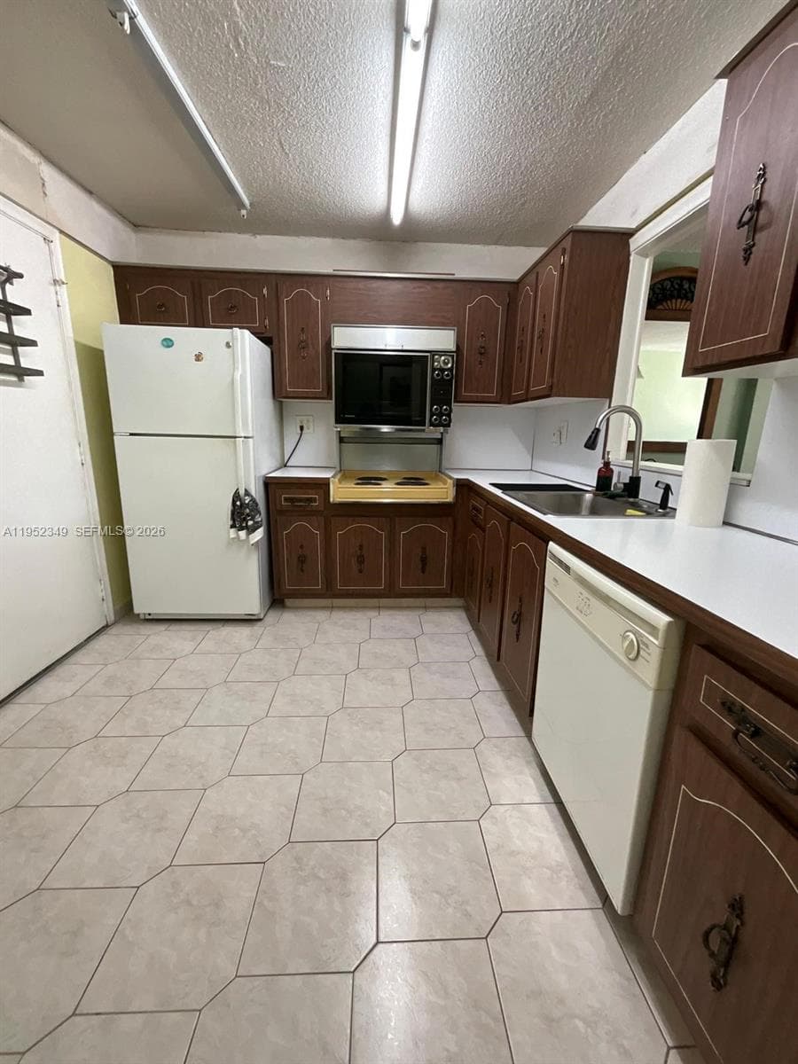 3600 NE 170th St # 107, North Miami Beach FL 33160 — 9