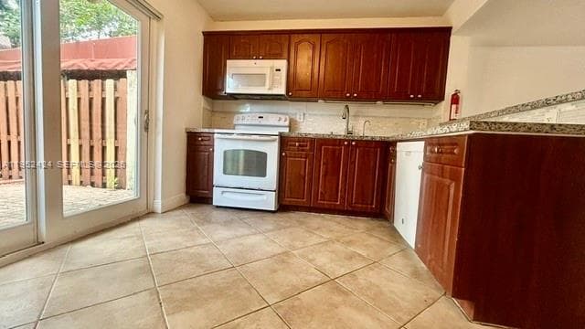 560 NW 82nd Pl # 306, Miami FL 33126 — 15