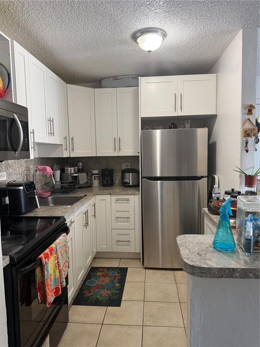 7120 NW 179th St # 105, Hialeah FL 33015 — 3