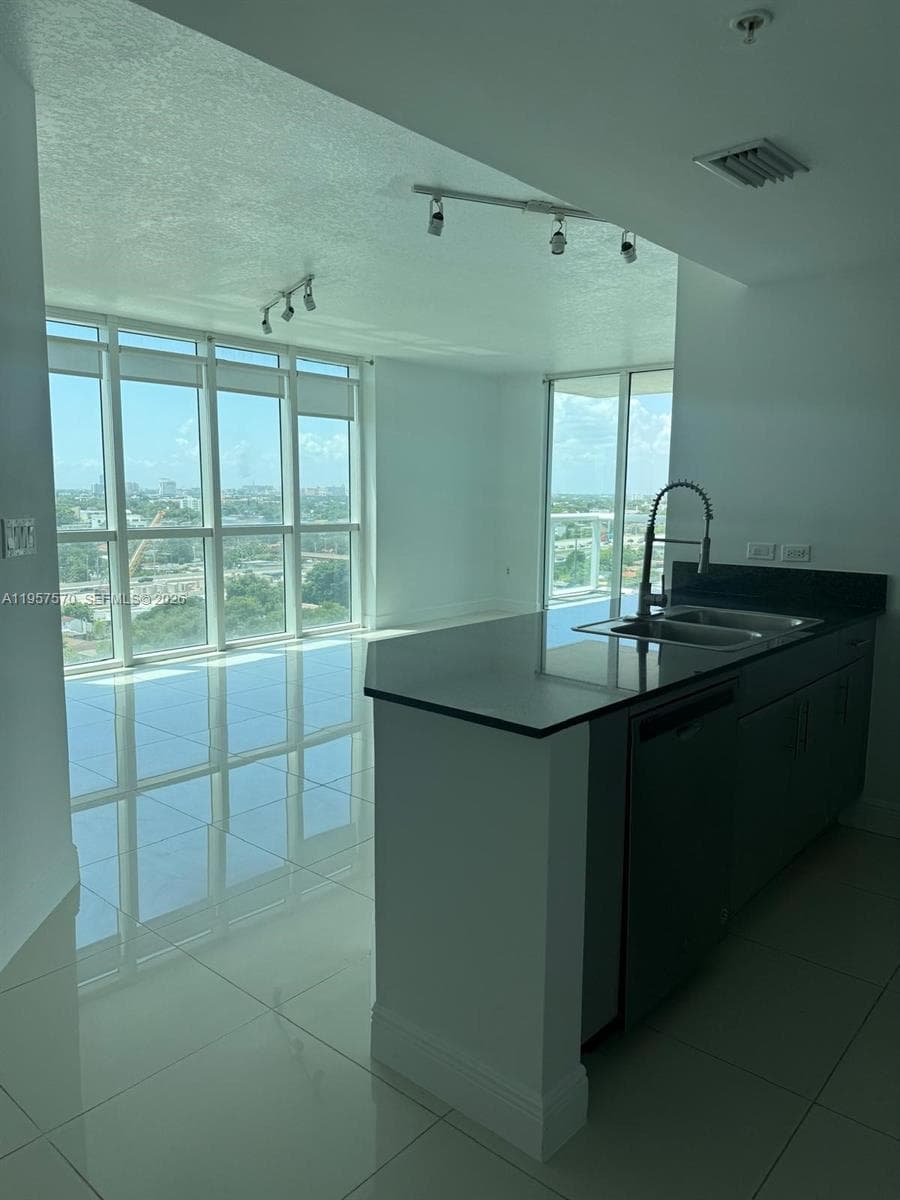 1871 NW S River Dr # 1503, Miami FL 33125 — 2