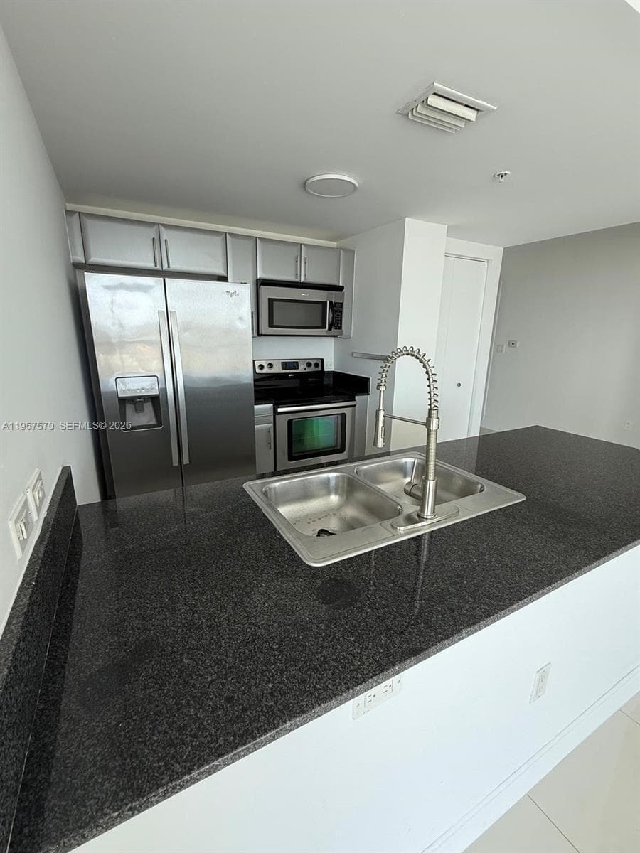 1871 NW S River Dr # 1503, Miami FL 33125 — 5