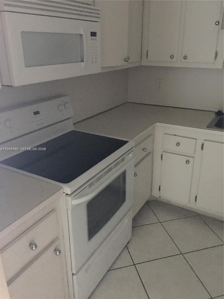 1200 NE Miami Gardens Dr # 315W, Miami FL 33179 — 25