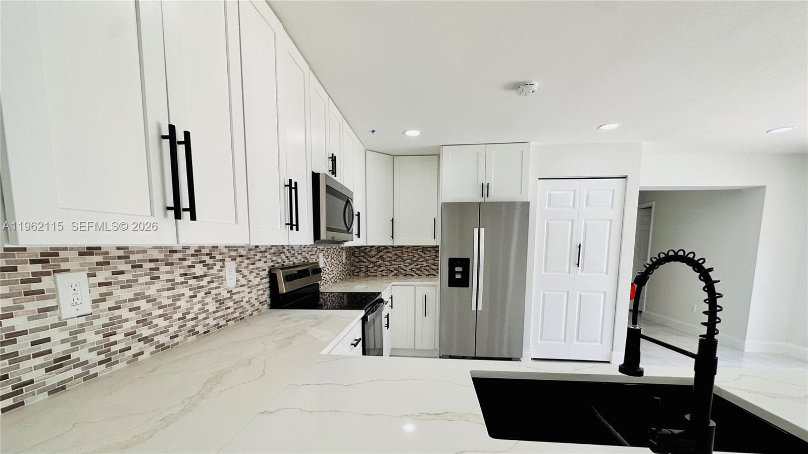 40 NW 125th St, North Miami FL 33168 — 25