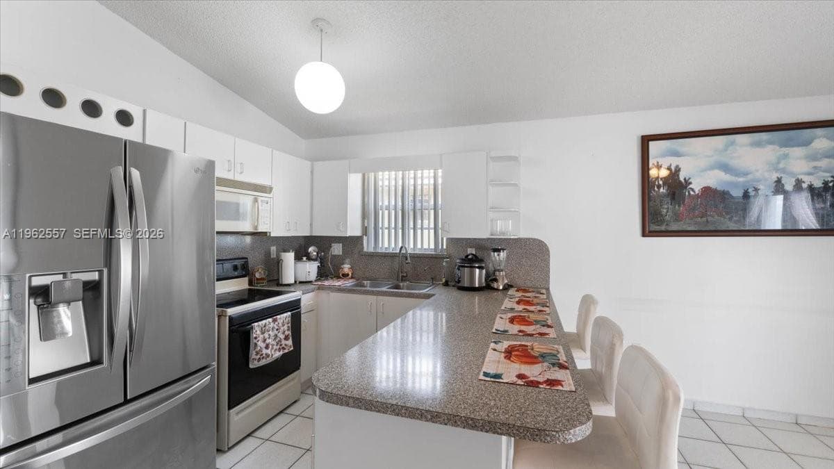 7568 W 4th Ct, Hialeah FL 33014 — 5