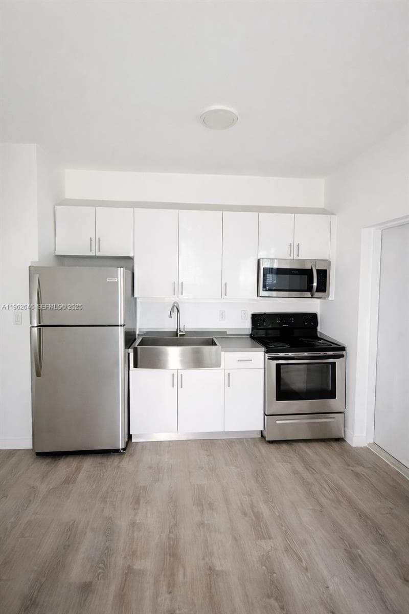 402 NW 12th Ave # 104, Miami FL 33128 — 2