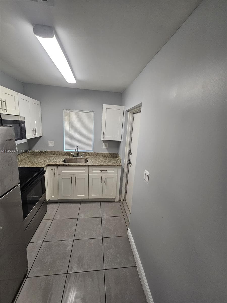 1128 NW 101st St, Miami FL 33150 — 4