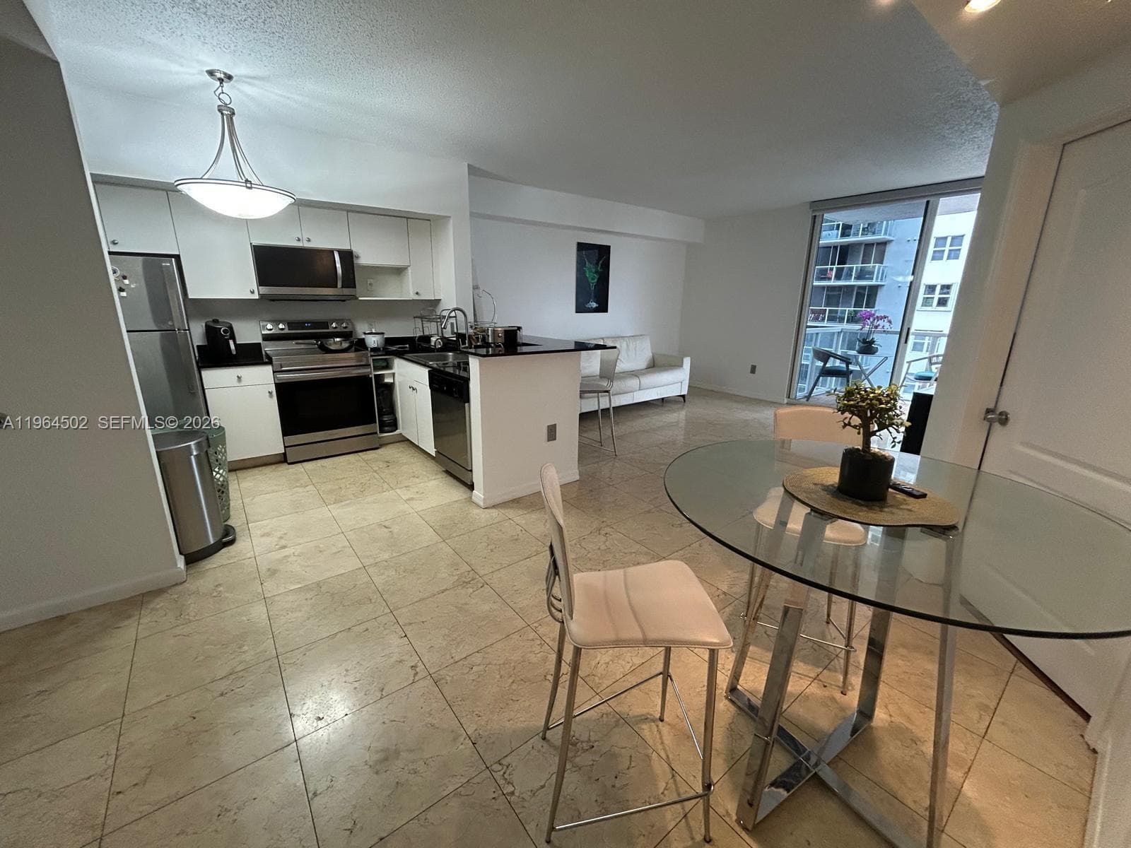 5077 NW 7th St # 1012, Miami FL 33126 — 7