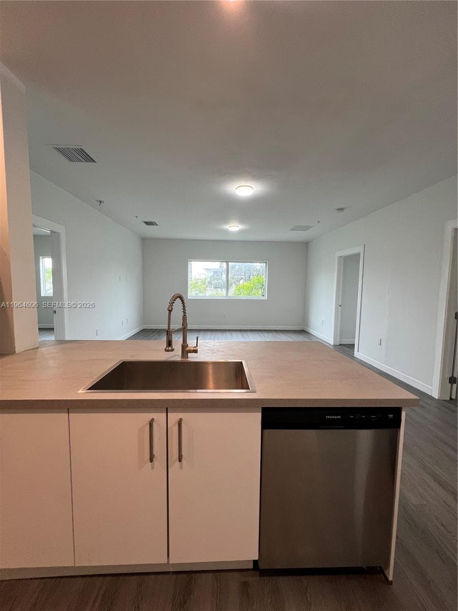 2311 NW 22nd Ave # 405, Miami FL 33142 — 1