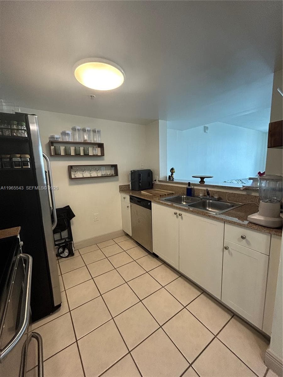 60 NW 37th Ave # 1205, Miami FL 33125 — 17