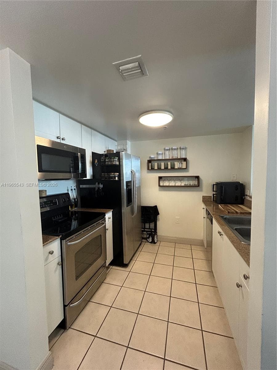 60 NW 37th Ave # 1205, Miami FL 33125 — 18