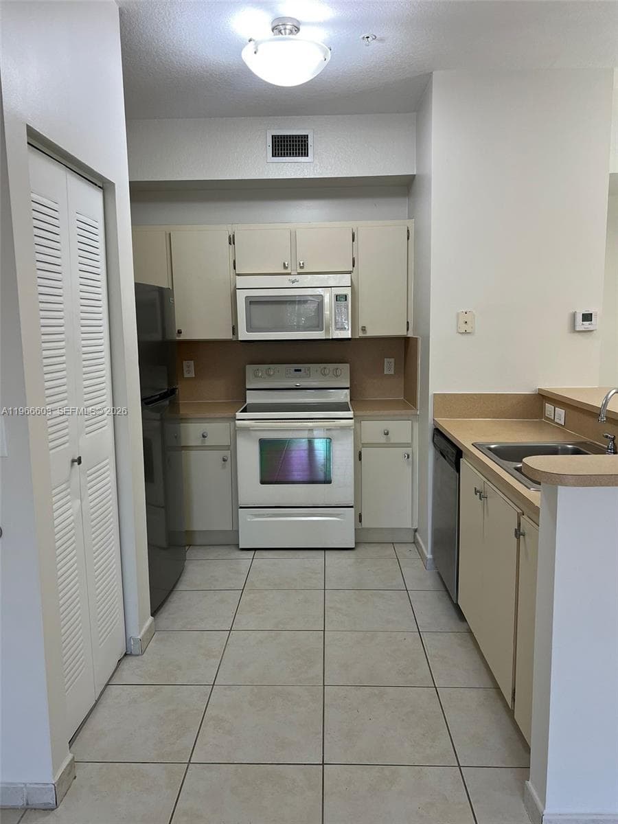 7220 NW 114th Ave # 307, Doral FL 33178 — 6