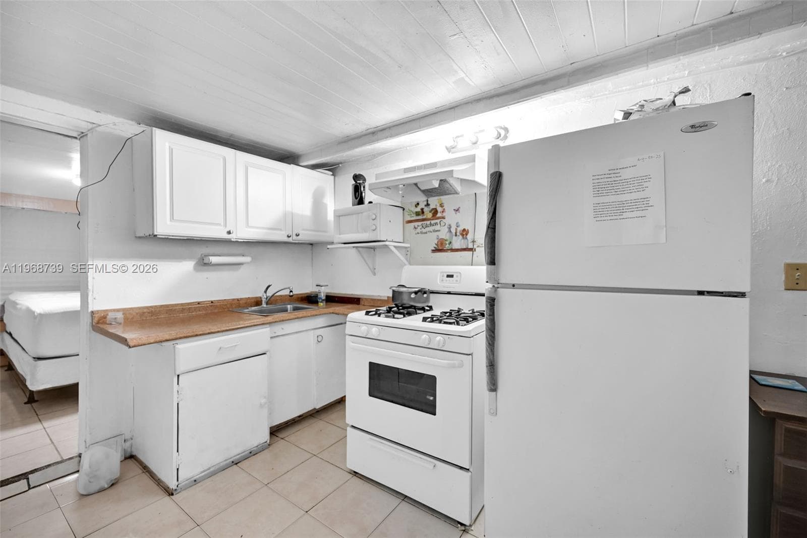 811 NW 24th Ct, Miami FL 33125 — 27
