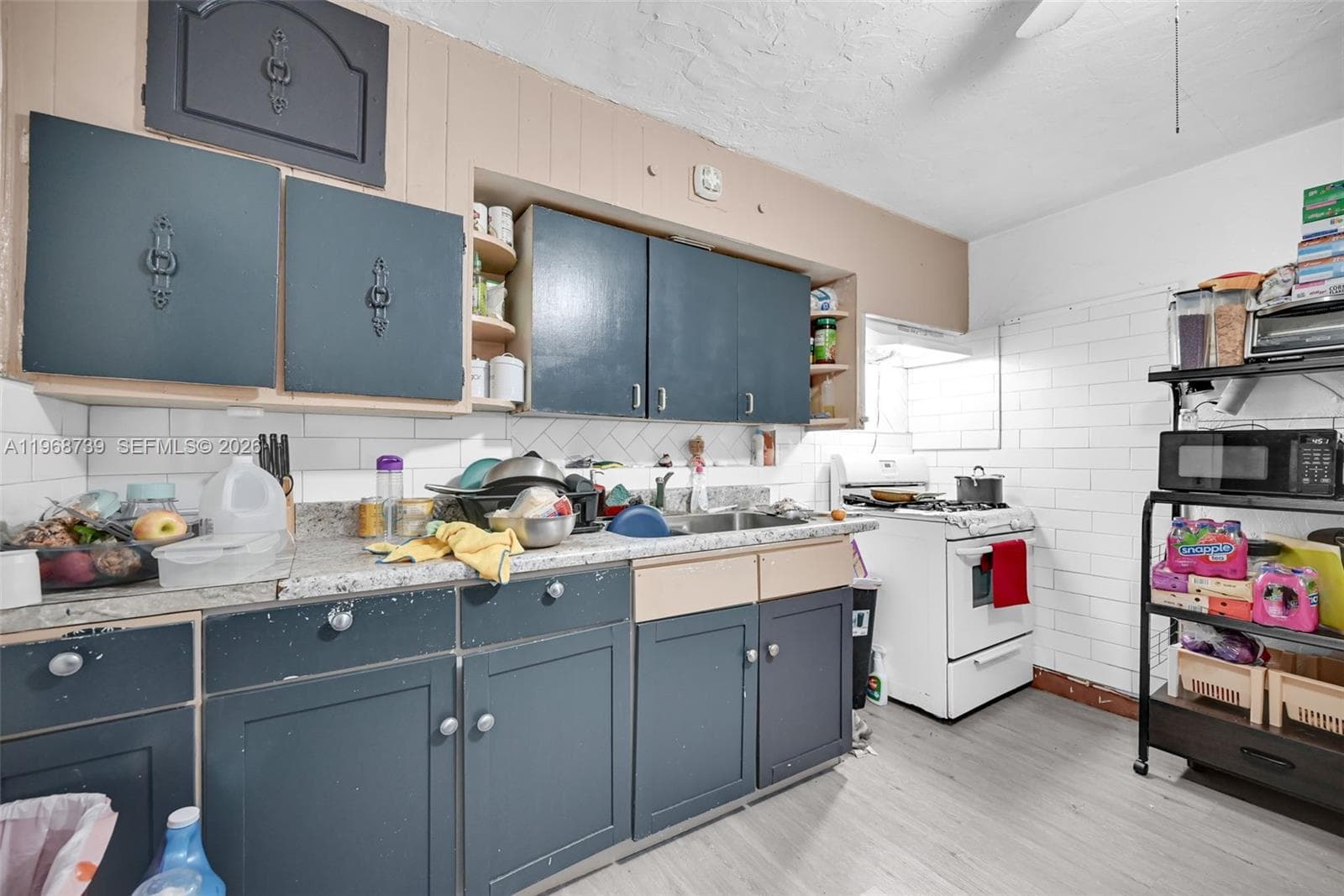 811 NW 24th Ct, Miami FL 33125 — 7