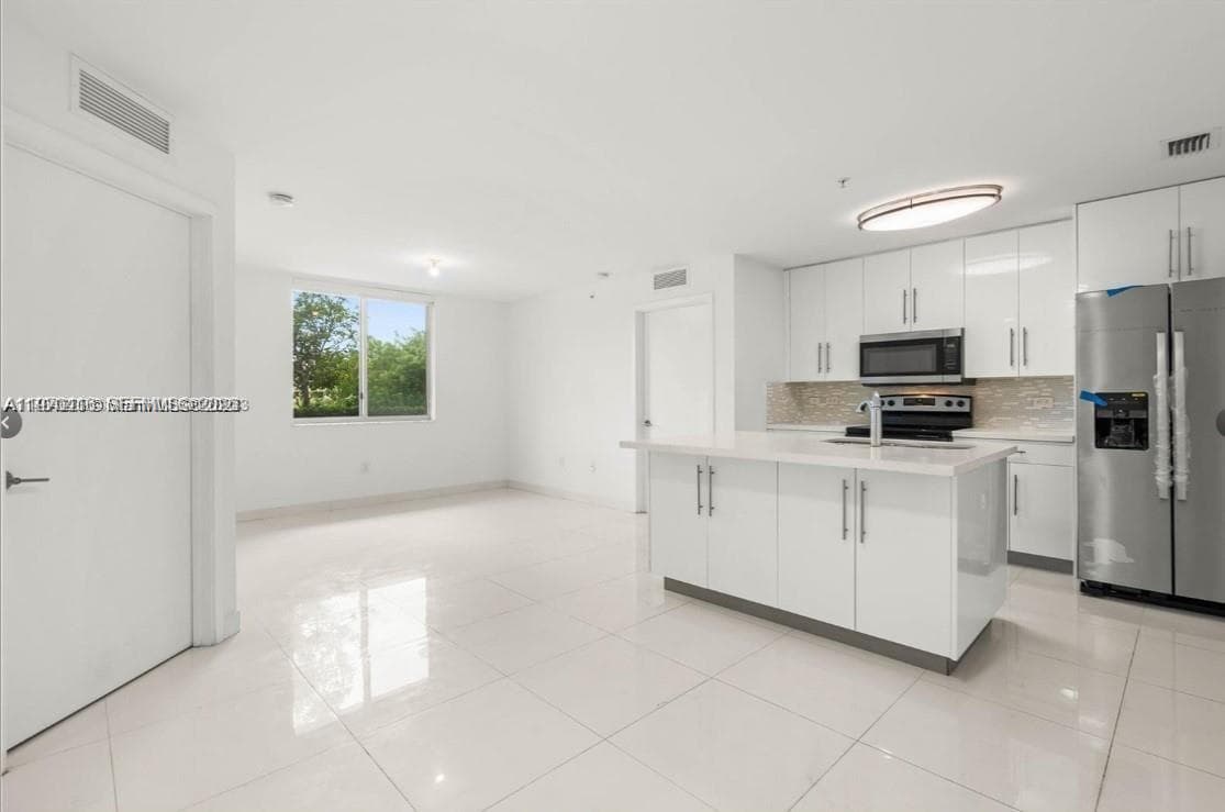 2651 NE 212th Ter # 105, Miami FL 33180 — 7
