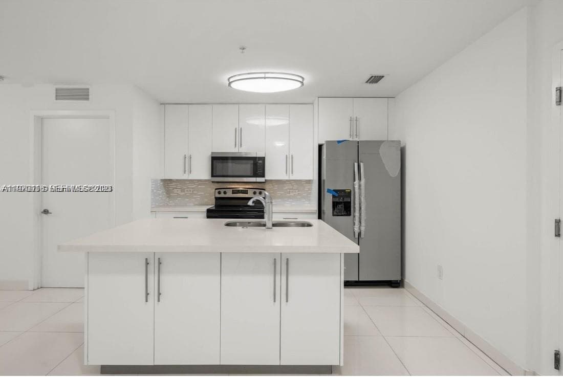 2651 NE 212th Ter # 105, Miami FL 33180 — 9