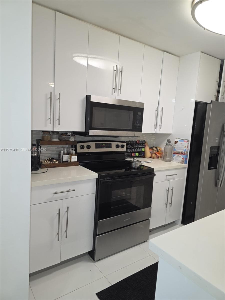 2651 NE 212th Ter # 105, Miami FL 33180 — 10