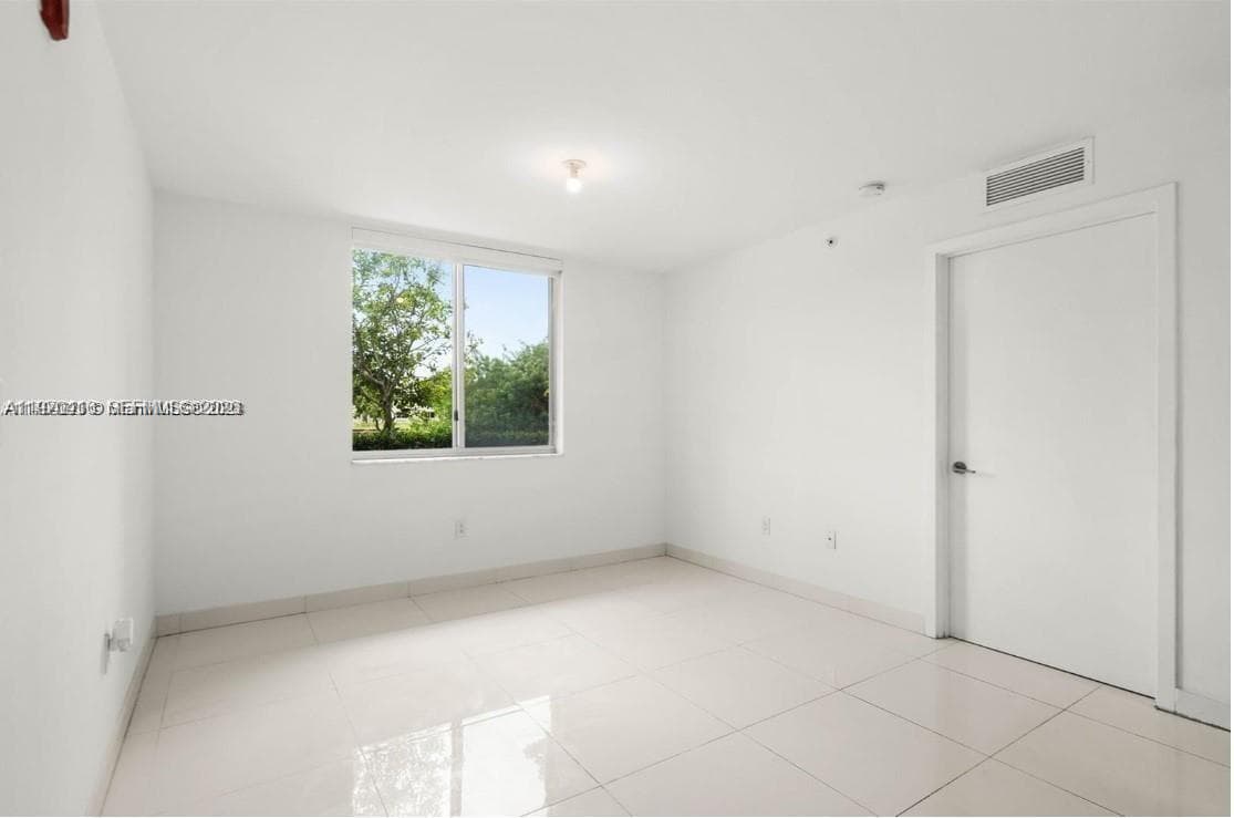2651 NE 212th Ter # 105, Miami FL 33180 — 11