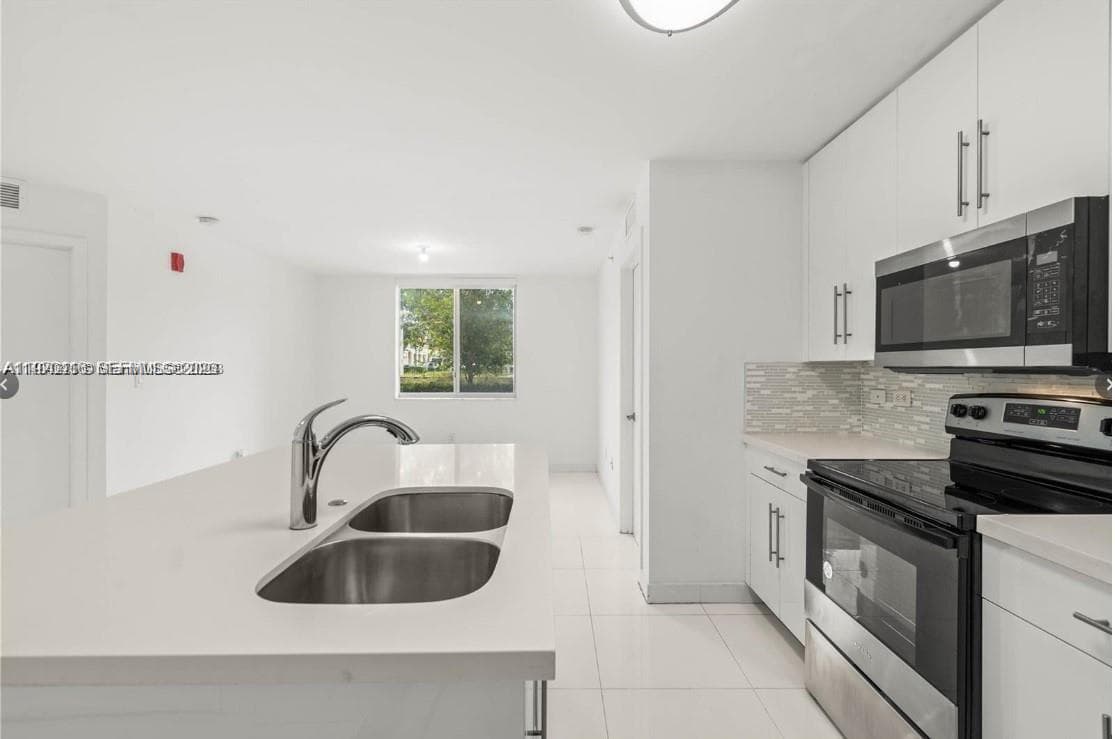 2651 NE 212th Ter # 105, Miami FL 33180 — 8