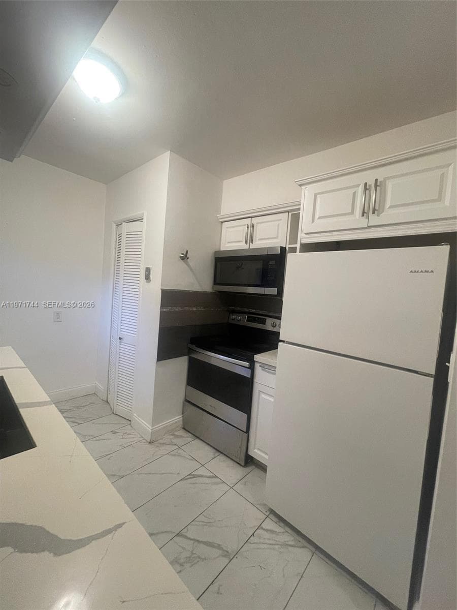 121 NE 169th Ter, North Miami Beach FL 33162 — 2