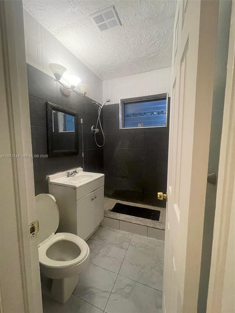 121 NE 169th Ter, North Miami Beach FL 33162 — 6